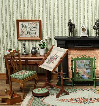 Dollhouse room showing several needlepoint items