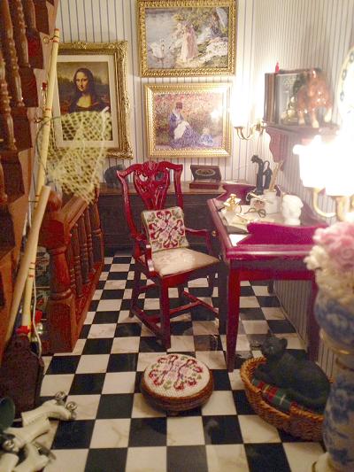Picture of the hallway, with a Sophie dollhouse needlepoint cushion and footstool