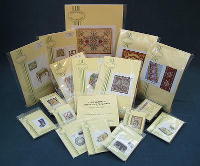 a range of Janet Granger miniature needlepoint kits in their packets