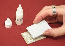 Miniature needlepoint tutorial - Glue the foam pad to the cardboard piece