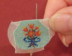Miniature needlepoint tutorial - pass the needle up through the very edge of the seam allowance