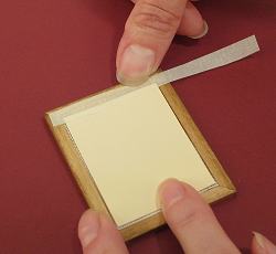 Dollhouse needlepoint tutorial - tape the back of the picture frame